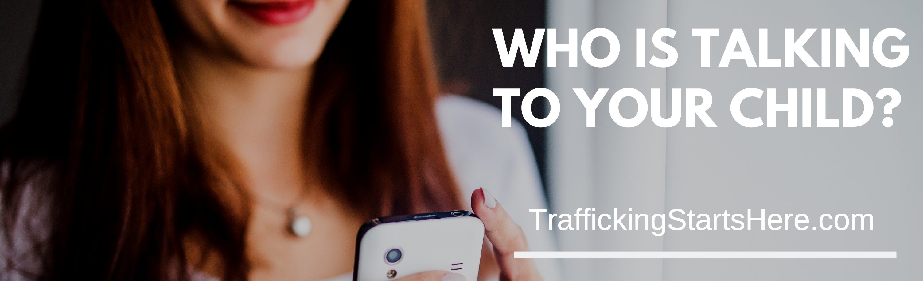 Clear Channel digital billboard: a young person on a phone, and the line Who is talking to your child. TraffickingStartsHere.com.